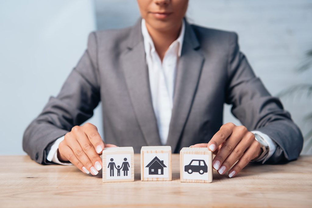 Woman touching wooden cubes